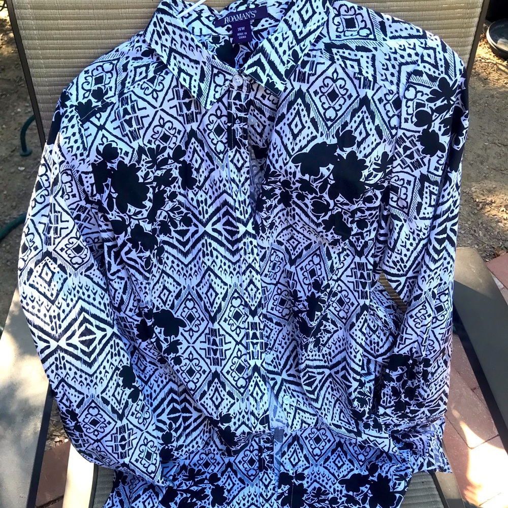 Elegant woman’s blouse. Fun to wear with jeans or dress skirt. Easy care